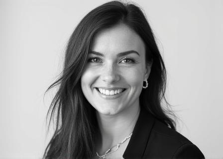 Professional black and white portrait of Sophia Reid, Lead Stylist.